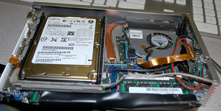 Illustration for article titled The DIY Mac Pro Mini: Turn that Broken MacBook into a Teeny Desktop